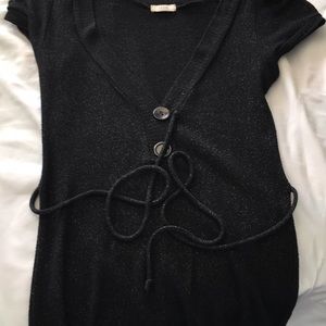 Black mini dress with two brown buttons low neck